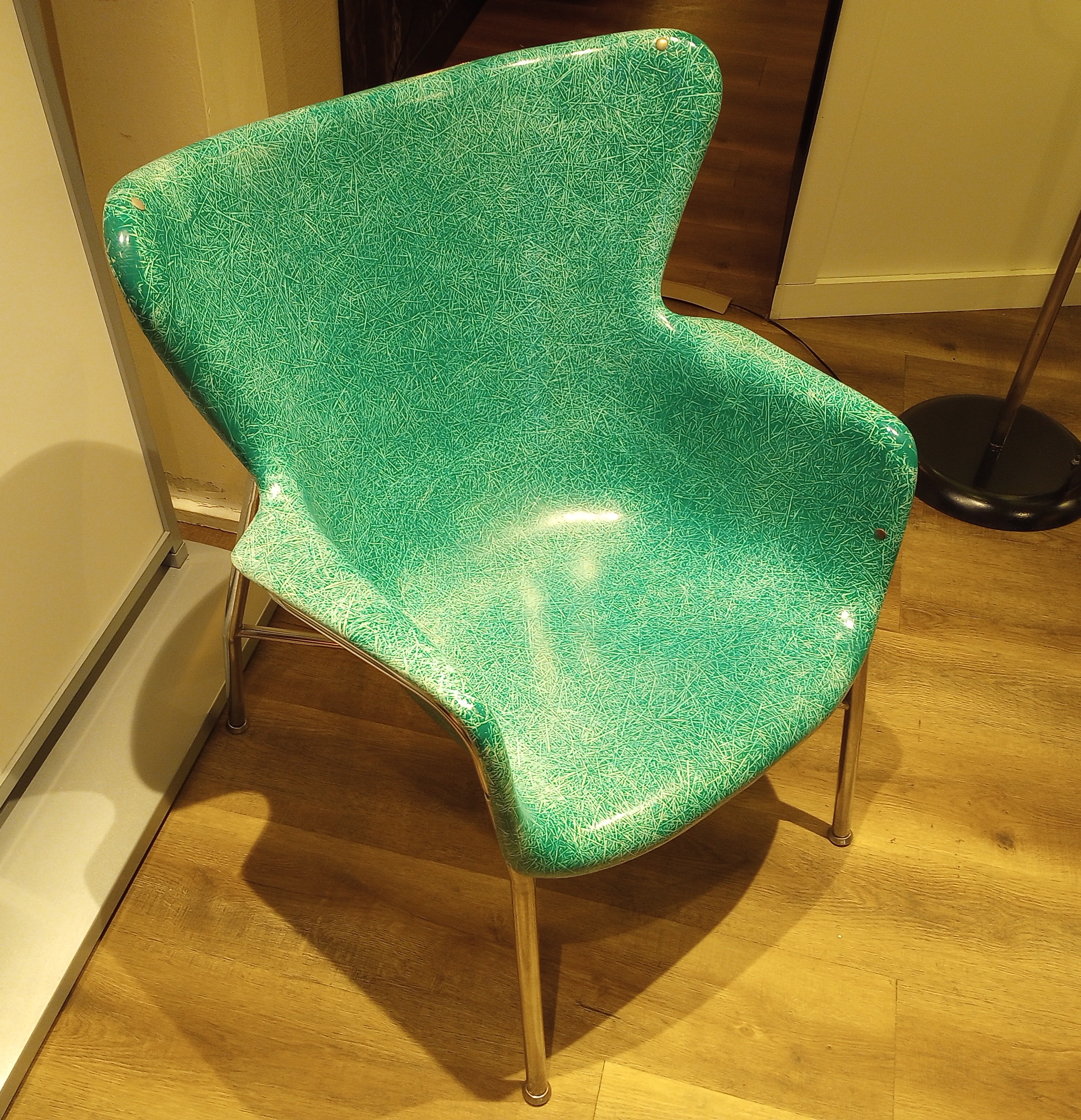 a curvy teal chair